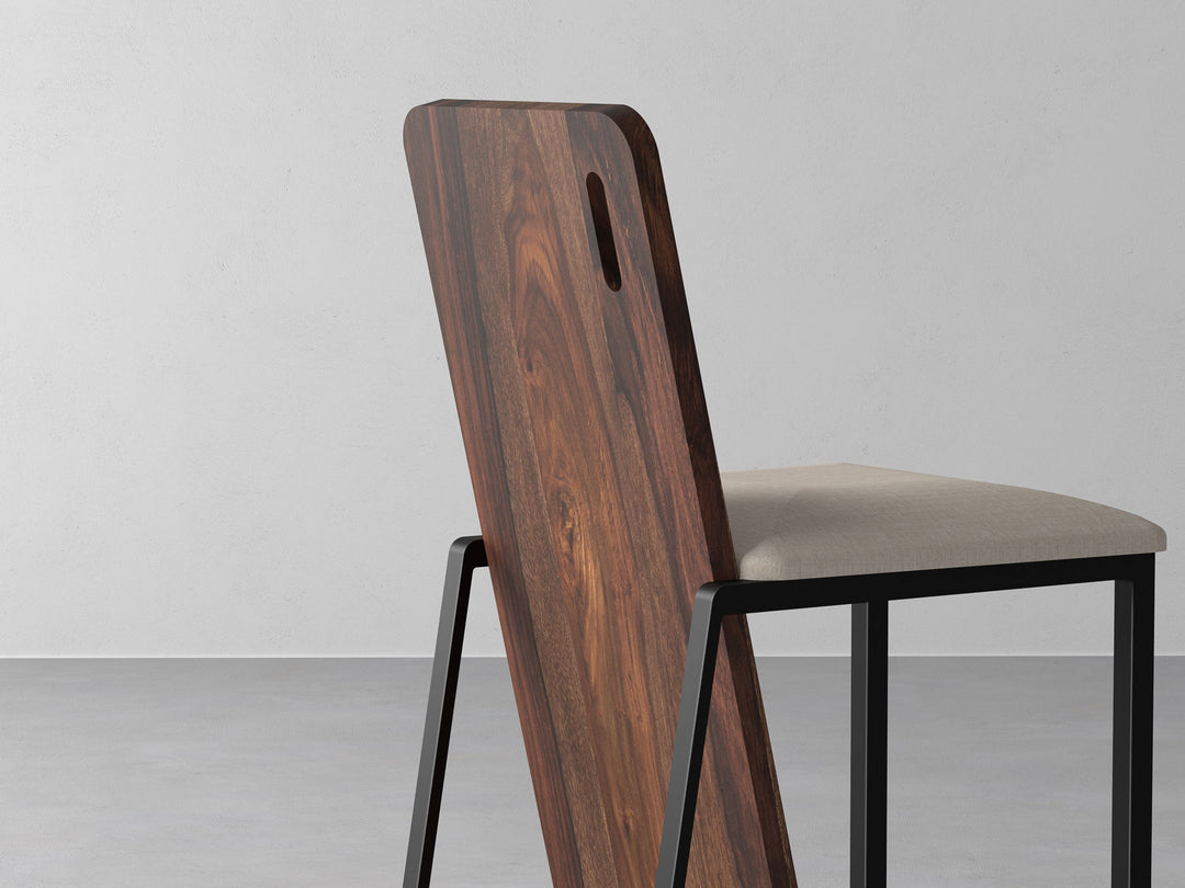 Dining chair made of solid sheesham wood and carbon steel