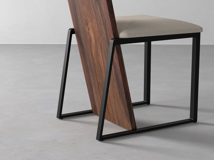 Dining chair made of solid sheesham wood and carbon steel