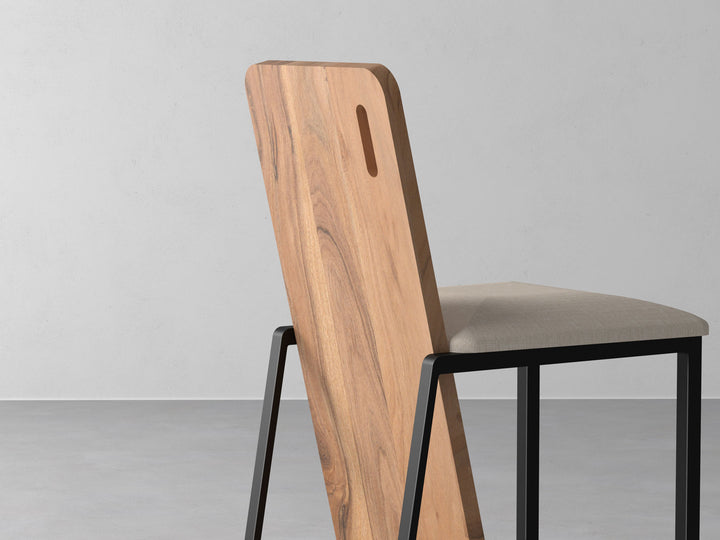 Dining chair made of solid acacia wood and carbon steel